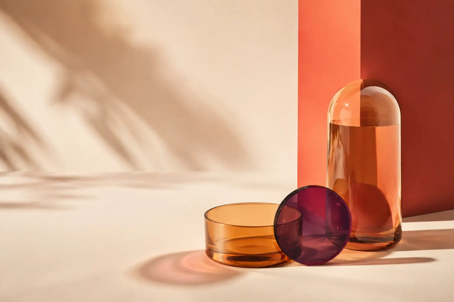 Amber, coral and plum glass forms creating a clear category signal